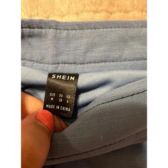 Set Blue Crop Top and skirt With Built-in Bra And Spaghetti Straps - Picture 3 of 3